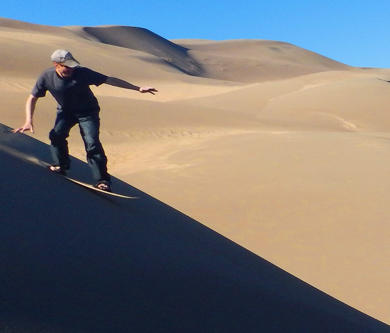 Visitors to the park are invited to actually surf the sand dunes. Choose from either sand sledding or sandboarding (think snowboarding, on sand), steady your balance and glide down the sand dunes.