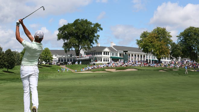 Curtis Luck hits his approach to the 18th green during the final round of the U.S. Amateur Sunday at Oakland Hills.
