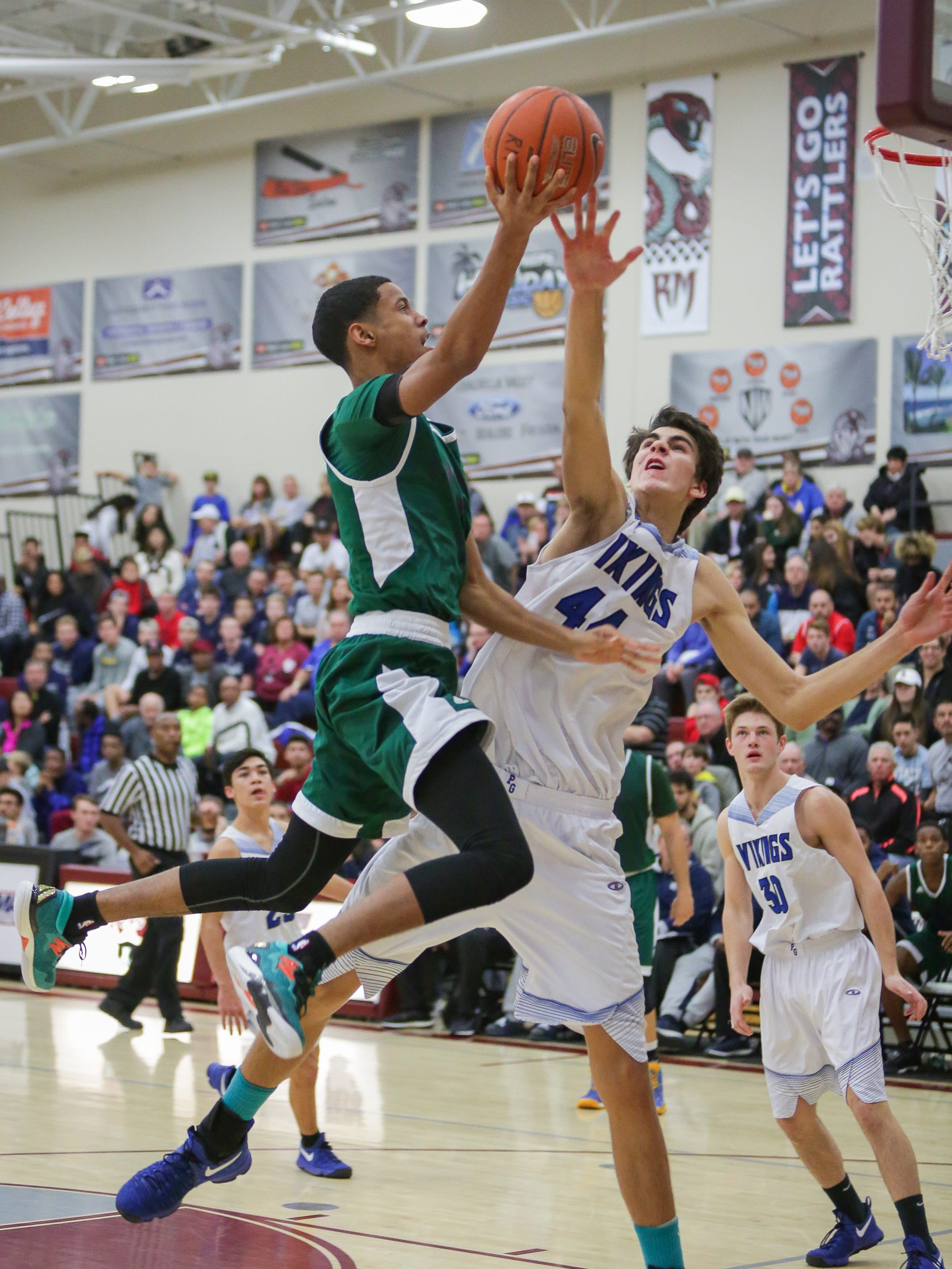 7 Foot 3 Sophomore Starting To Fill His Own Shoes
