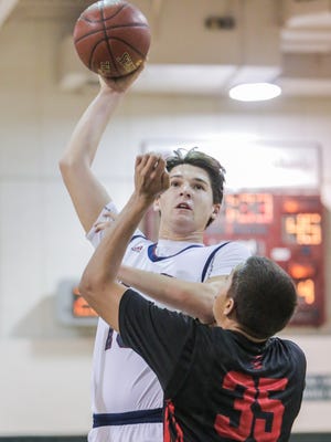 La Quinta's Tommy Mooney puts up a shot against Palm Springs earlier this year. On Tuesday, the Blackhawks topped Shadow Hills for a crucial DVL win.