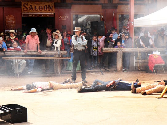 TOMBSTONE: Costumed stuntmen re-enact a Wild West shootout