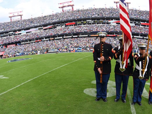 The Seahawks' sideline empty during the national anthem