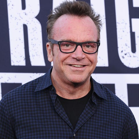 Tom Arnold is playing up his relationship with...