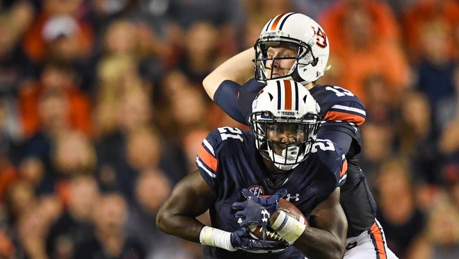 Running back Kerryon Johnson, quarterback Sean White and the Auburn Tigers need a win this week.