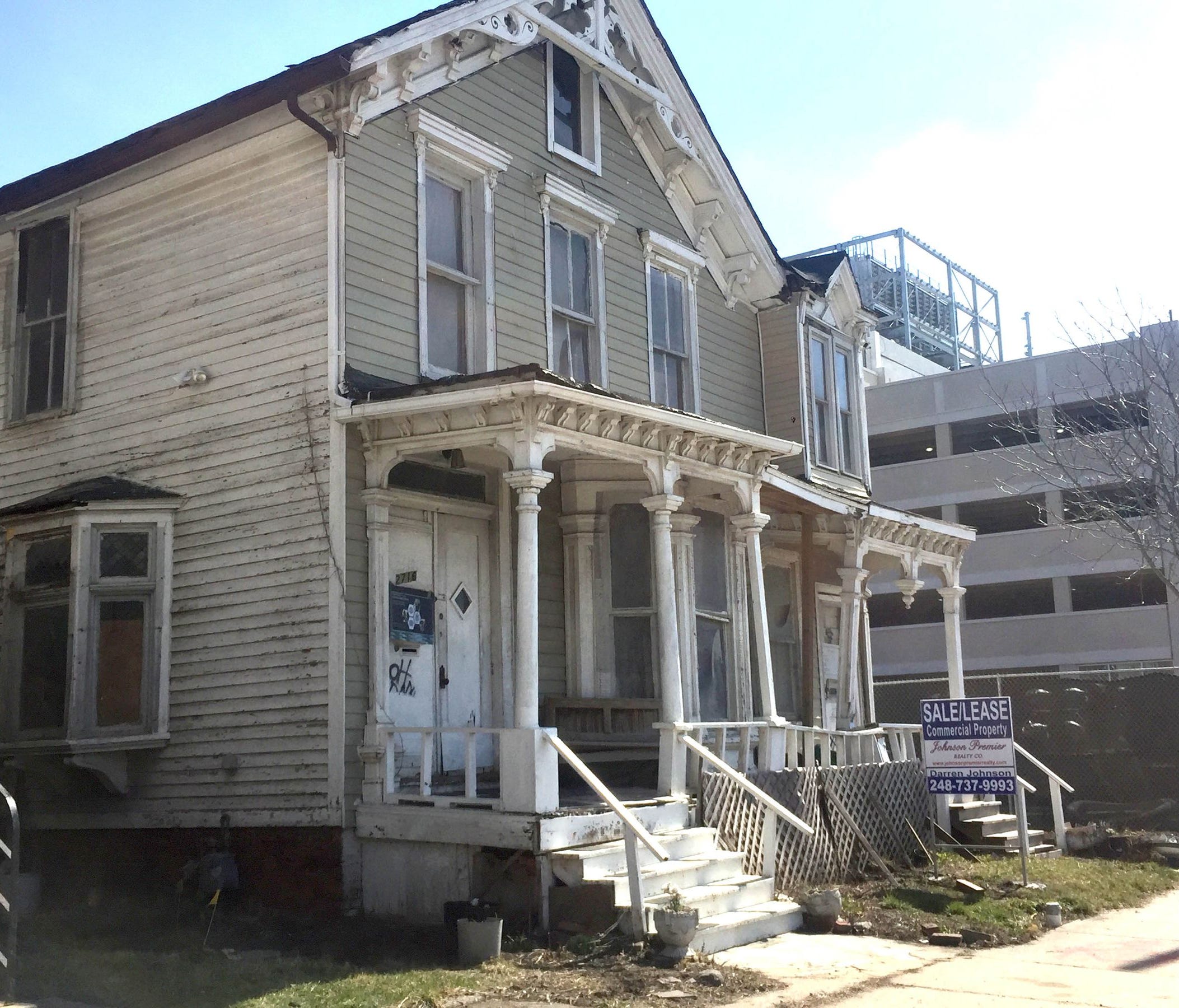 This dilapidated house on Cass Avenue near Little Caesars Arena is back on the market for $4.9 million. It is a 2-story wood structure. Picture taken March 21, 2017.