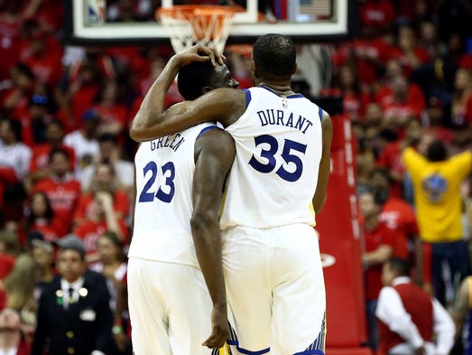May 28: Draymond Green and Kevin Durant hug in the
