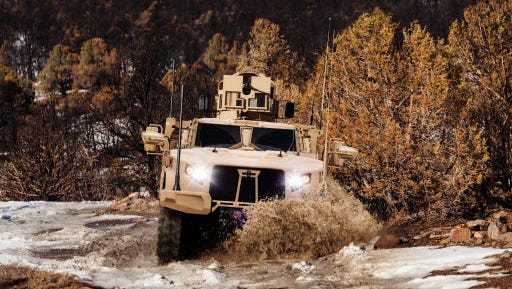 Oshkosh Corp, which builds military vehicles, is the state's largest defense contractor.