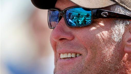 Former Green Bay Packers quarterback Brett Favre looks out onto the field before playing a flag football game Sunday, July 19, 2015, at Camp Randall Stadium in Madison, Wis. Favre was inducted into the Packers Hall Fame Saturday. (AP Photo/Andy Manis)