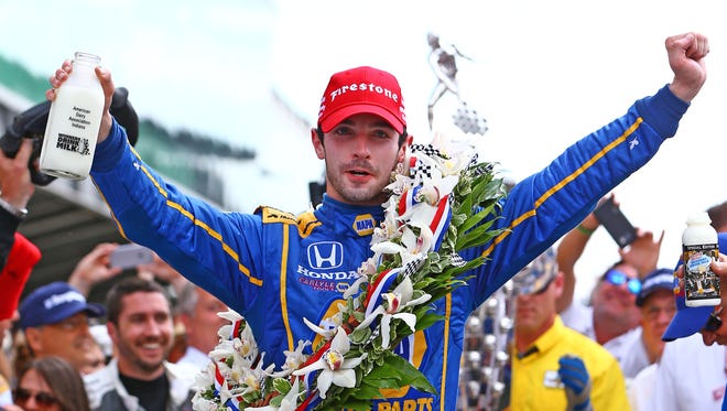 May 29, 2016: IndyCar Series driver Alexander Rossi celebrates after winning the 100th running of the Indianapolis 500 at Indianapolis Motor Speedway.