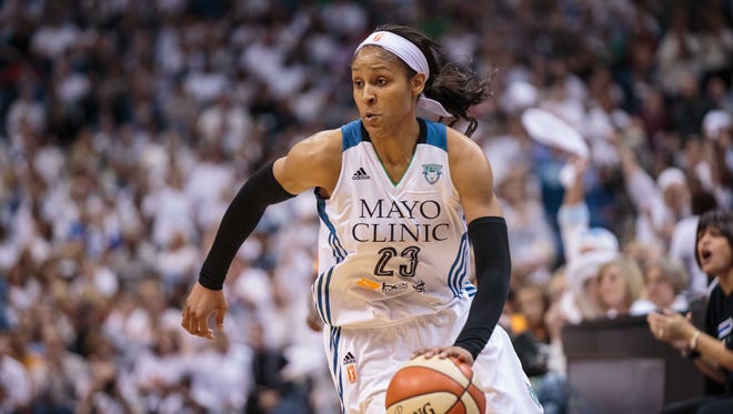 Maya Moore dribbles in the third quarter against the Indiana Fever at Target Center. The Minnesota Lynx beat the Indiana Fever 69-52.