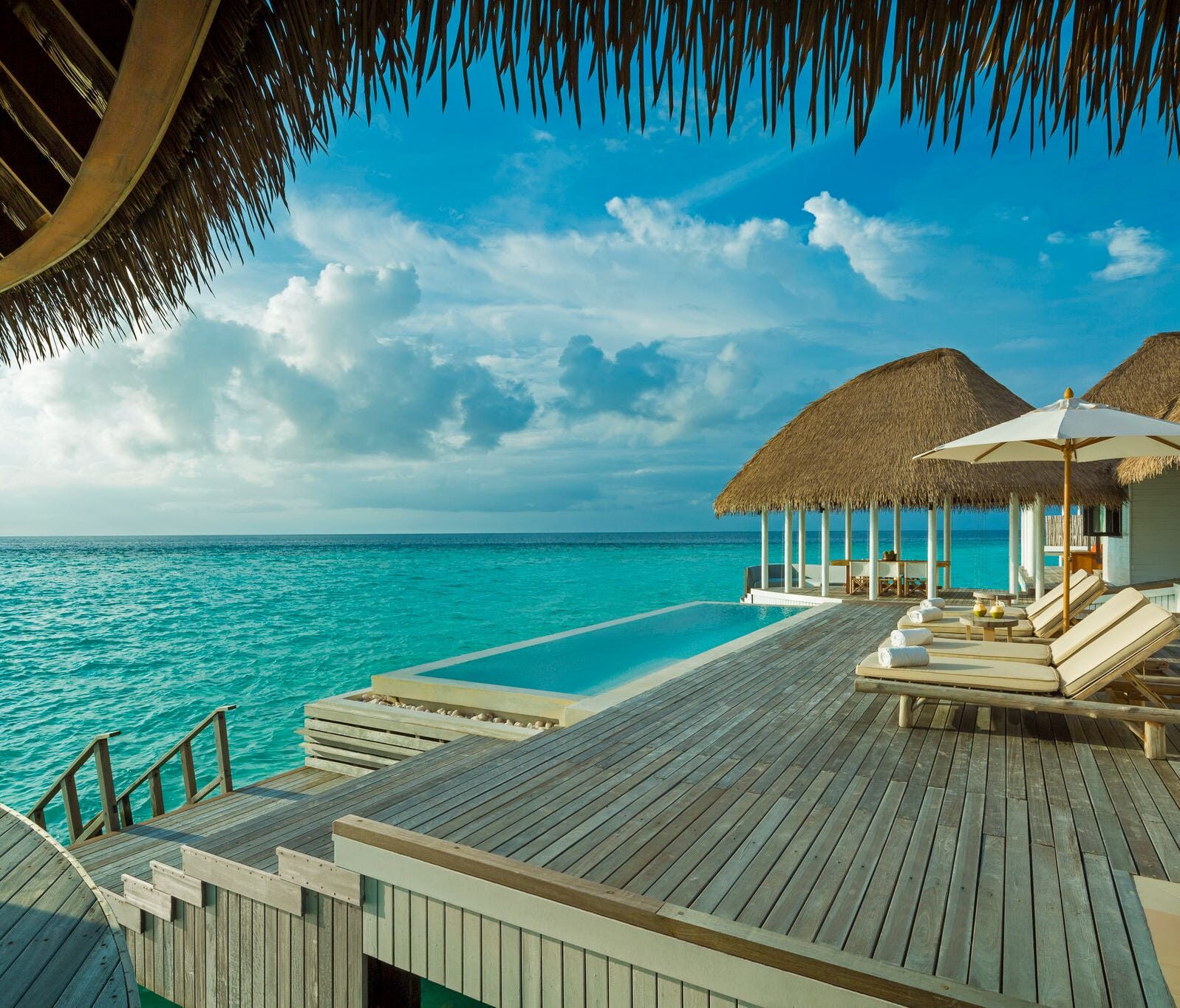 Como Maalifushi is situated on the pristine Thaa Atoll in the Maldives, known for its diving and surf breaks. The property's two-bedroom overwater Como villas, priced at $1,400 per night including breakfast, sit above the turquoise lagoon with their 
