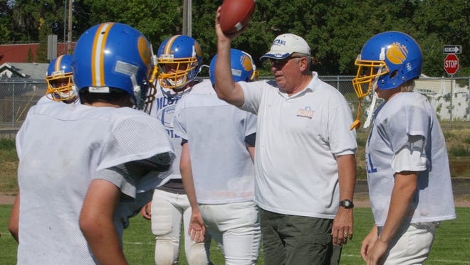 Hugh Smith served as principal and athletic director at Great Falls Central for 12 years and for a year seasons was the Mustangs' football coach. The school, which resumed its academic and athletic missions about 20 years ago, will compete on Saturday in the semifinals of the Class C eight-man football playoffs.