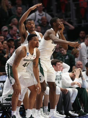 Nick Ward, Xavier Tillman and Jaren Jackson Jr. react at the end of MSU's 55-53 loss to Syracuse in the NCAA tournament Sunday, March 18, 2018 at Little Caesars Arena.