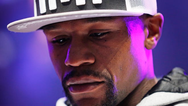 Boxer Floyd Mayweather Jr. speaks during an arrival ceremony Tuesday in Las Vegas.