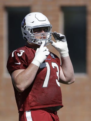 Arizona Cardinals offensive lineman John Wetzel takes a break during practice on Friday, Oct 14, 2016, at the team's training facility in Tempe.