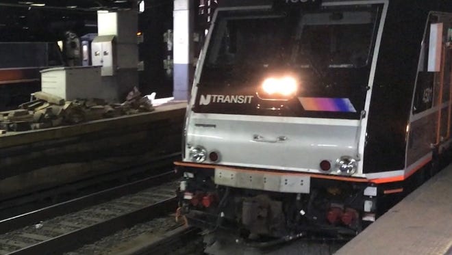 An NJ Transit train pulls into Penn Station in New York.