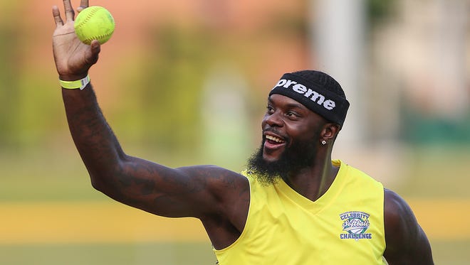 Indiana Pacer Lance Stephenson holds up the ball after outing a Colts team opponent during the 10th Annual Caroline Symmes Memorial Celebrity Softball Challenge at Victory Field in Indianapolis, Thursday, June 7, 2018. The game raises funds for the Indiana ChildrenÕs Wish Fund, granting wishes to Indiana children who have life-threatening illnesses.