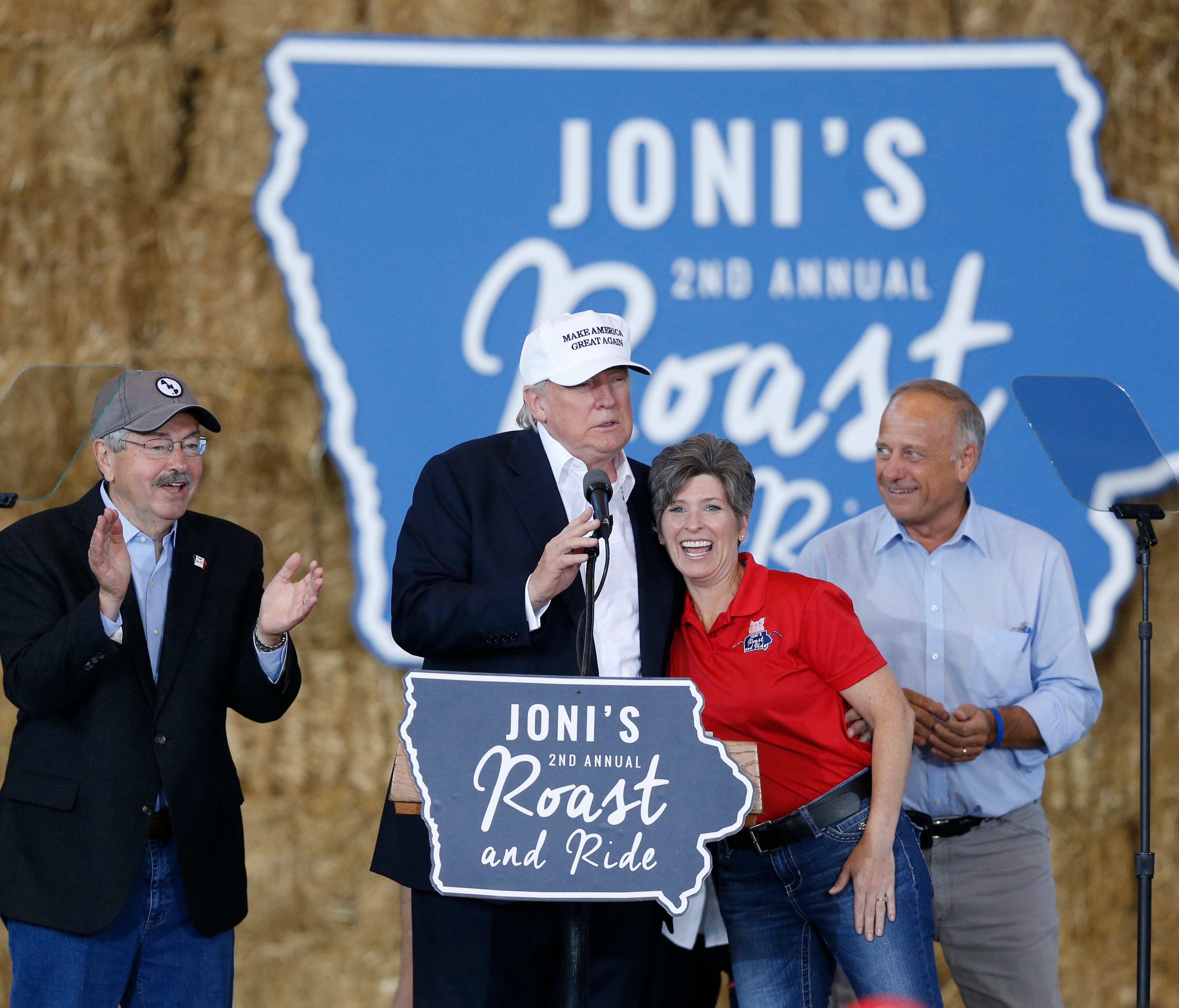 Gov. Terry Branstad joins Republican presidential candidate Donald Trump on stage along side Sen. Joni Ernst and Rep. Steve King during the second annual Roast and Ride at the Iowa State Fairgrounds in 2016.