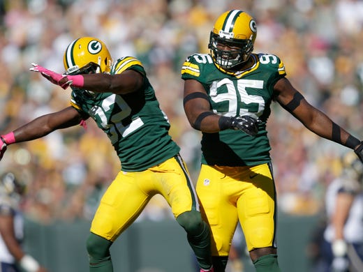 Green Bay Packers defenders Chris Banjo and Datone