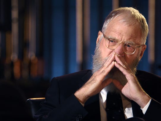 David Letterman listens to former President Obama on