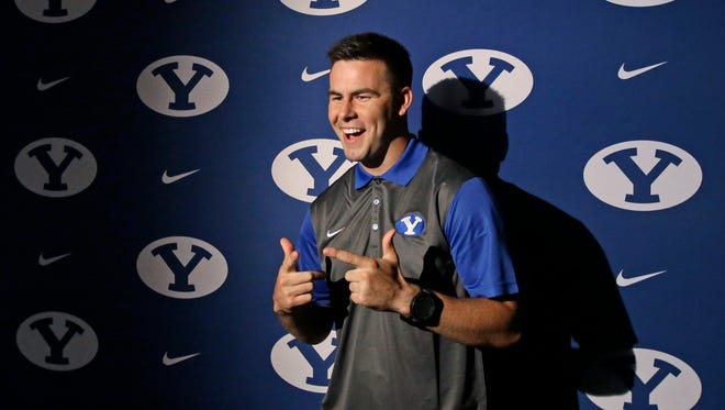 BYU quarterback Tanner Mangum poses for a photograph during BYU's football media day on Thursday.