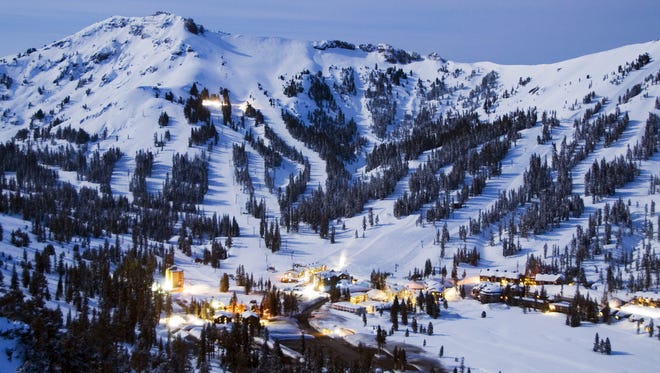 Kirkwood Mountain Resort is illuminated by the light from a full moon during winter 2012. The resort, operated by Vail Mountain Resorts, is currently under investigation for causing harm to the environment by plowing asphalt grindings into sensitive streams and wetlands. Kirkwood has until Sept. 15, 2016 to produce a remediation report for California's Central Valley Regional Water Quality Control Board.