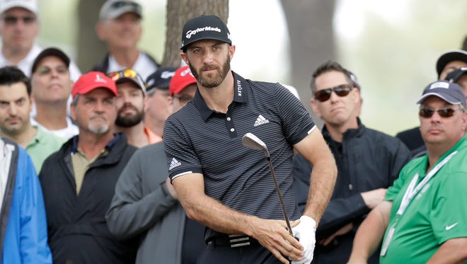 Dustin Johnson has injured his back and his status for the Masters is uncertain.