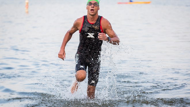 FILE -- Hundreds of athletes traveled from all over the world to compete in the 2018 Ironman 70.3 at Prairie Creek Reservoir.