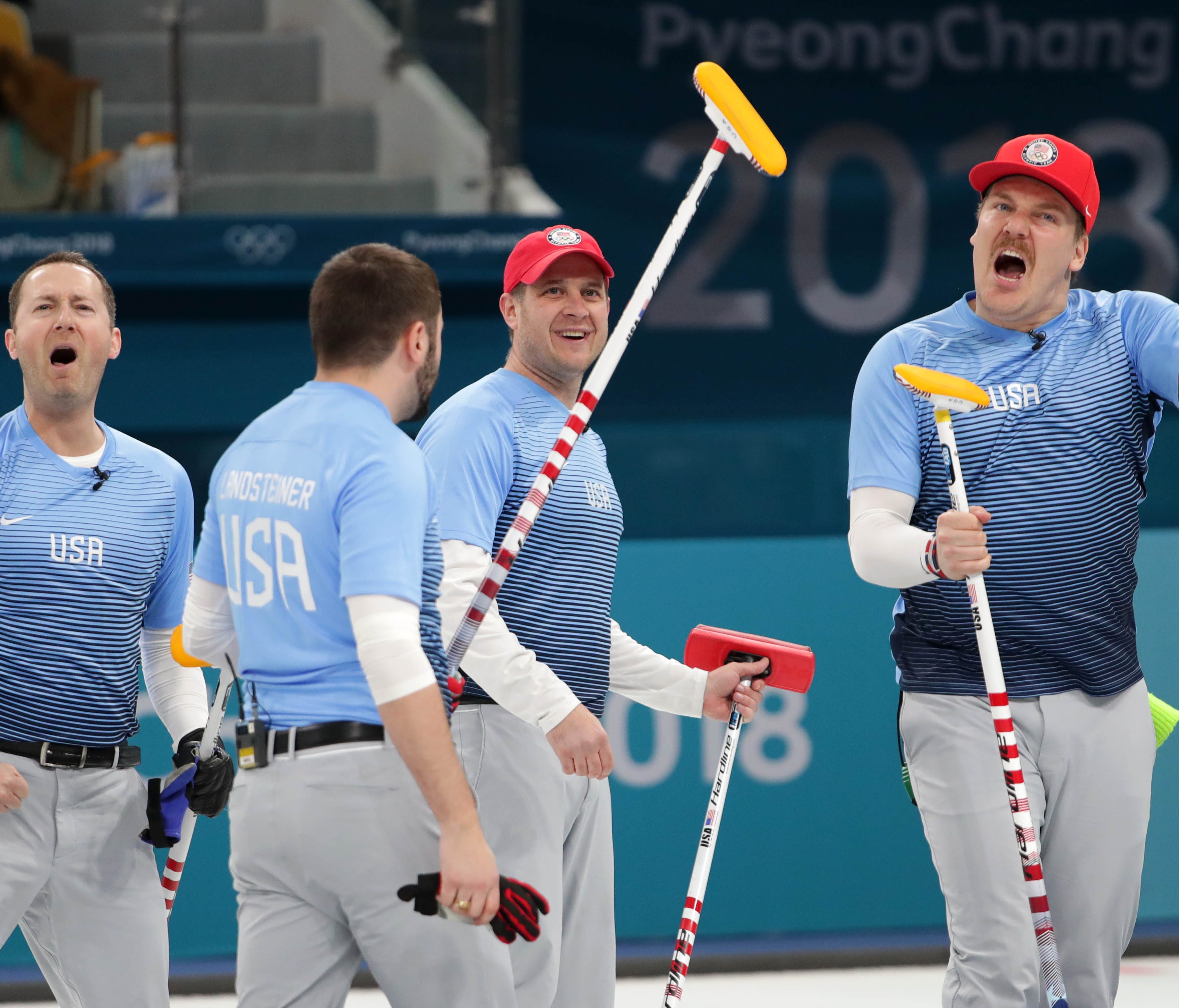 Team USA celebrates after defeating Canada in the men's curling semifinals.