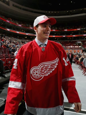 Dominic Turgeon walks  after being drafted by the Detroit Red Wings at the 2014 NHL draft.