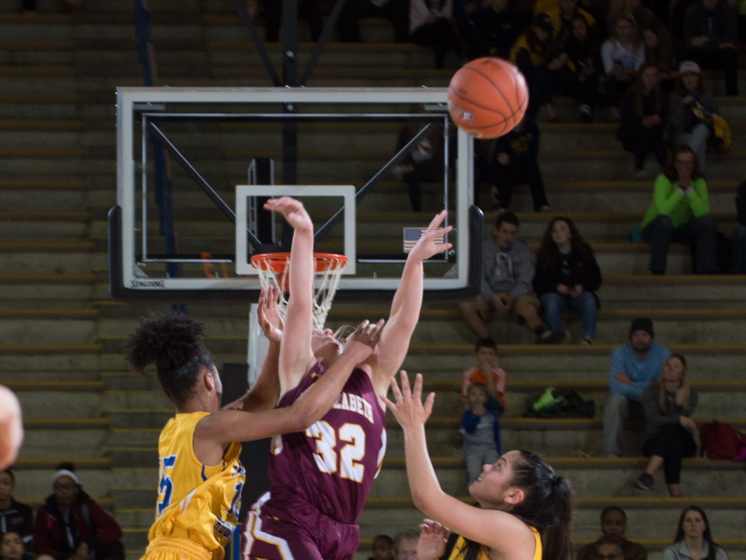 St. Elizabeth’s Alexis Bromwell (32) is fouled with .04 seconds to go in the third period in the quarterfinals of DIAA Girls Basketball Tournament at the University of Delaware against Caesar Rodney.