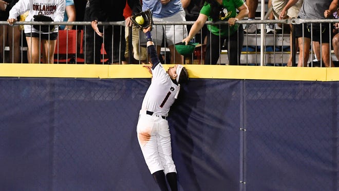Auburn's Tiffany Howard robs a home run with a great catch against Oklahoma during Game 2 of the Women's College World Series on Tuesday in Oklahoma City.
Dakota Sumpter/Auburn Athletics