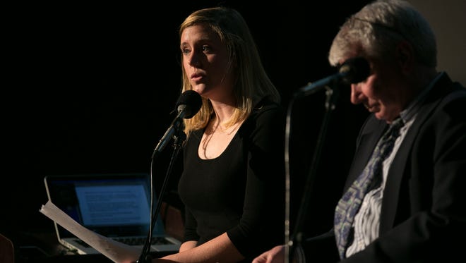 Veronica Volk of WXXI News and Gary Craig of the Democrat & Chronicle speak during the recording of the final episode of Finding Tammy Jo at The Little Theatre in Rochester on Monday, June 13, 2016.