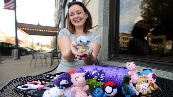 Rebecca Turner holds a crocheted creation of the Pokemon character Squirtle during an interview Thursday. Turner has been crocheting for 5 years and would leave the characters around Jackson for people who would play the game, Pokemon Go.