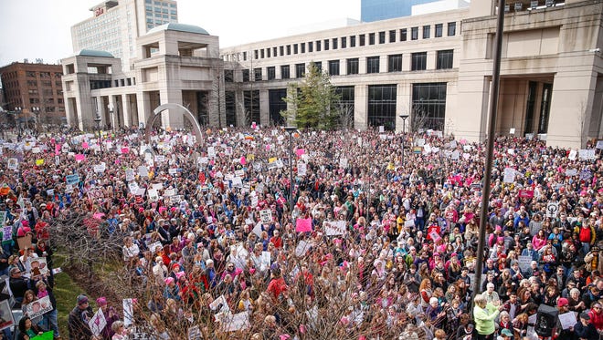 Thousands attend the Women's March Indianapolis rally, a sister rally of the Women's March on Washington, on the west side of the Indiana Statehouse in Indianapolis on Saturday, Jan. 21, 2017.