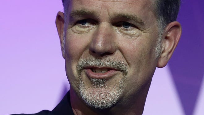 Founder and CEO of Netflix Reed Hastings speaks during a keynote at the Mobile World Congress in Barcelona, Spain, Monday, Feb. 27, 2017. The Mobile World Congress will be held 27 Feb. to 2 March.