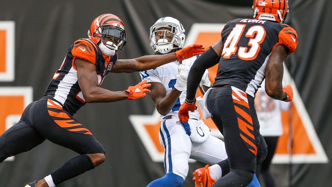 Indianapolis Colts wide receiver T.Y. Hilton (13) is targeted on a long pass down the field but cannot come up with the catch in the tight coverage by Cincinnati Bengals cornerback William Jackson (22) at Paul Brown Stadium in Cincinnati on Sunday, Oct. 29, 2017. 