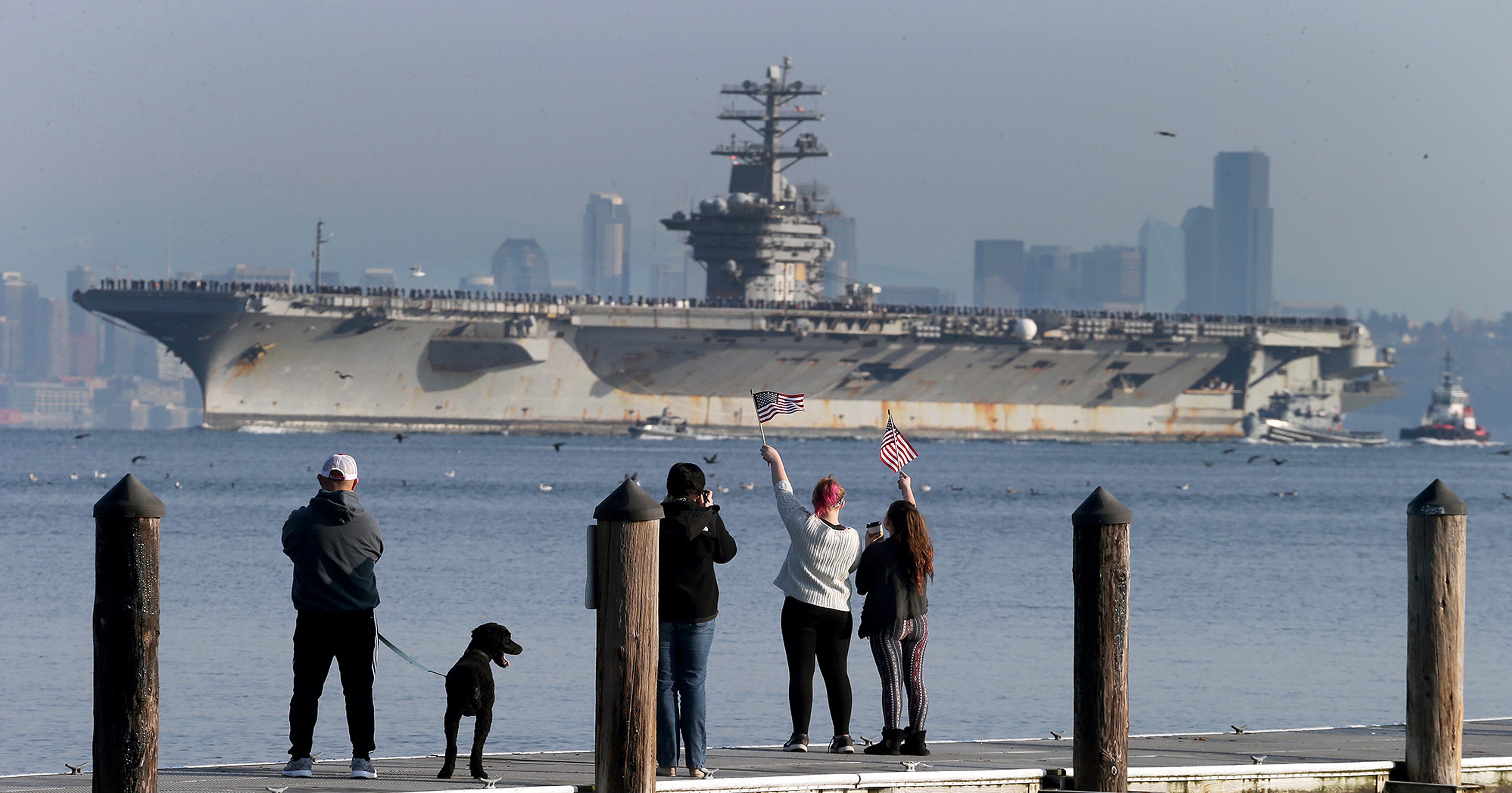 USS Nimitz enters Puget Sound Naval Shipyard's dry dock for a year of
