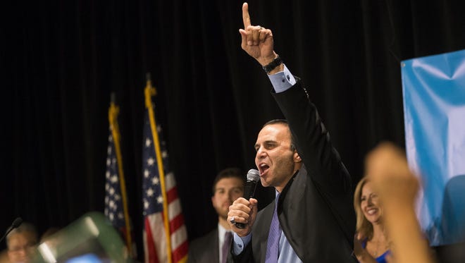 Democrat Paul Penzone celebrates his Maricopa County sheriff victory over incumbent Sheriff Joe Arpaio at the Arizona Democratic Party's election night bash at the Renaissance Phoenix Downtown Hotel on Nov. 8, 2016. Penzone, who will take office in January, is a former Phoenix police sergeant who narrowly lost to Arpaio in 2012