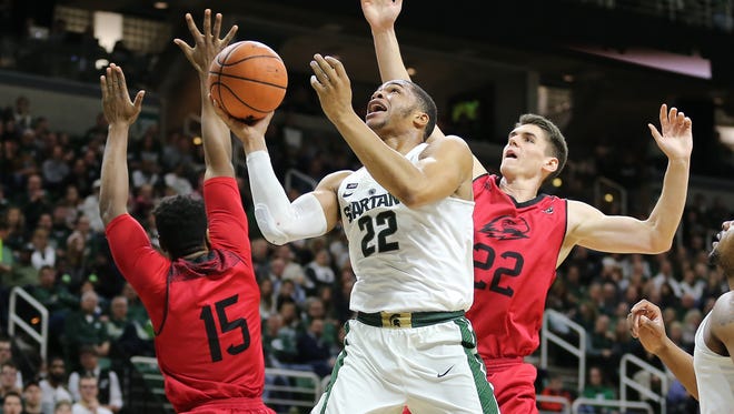 Miles Bridges #22 of the Michigan State Spartans shoots the ball against of the Southern Utah Thunderbirds at Breslin Center on December 9, 2017 in East Lansing, Michigan.