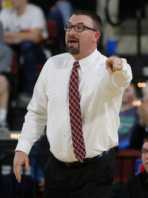 Bozeman boys' basketball head coach Wes Holmquist led the Hawks to another outstanding season. The team's second-place finish at the state tournament helped Bozeman clinch the Great Falls Tribune's All-Sports Trophy Award.