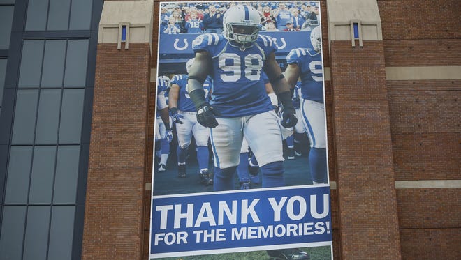 A large banner thanking former Indianapolis Colts outside linebacker Robert Mathis (98) hangs on the side of Lucas Oil Stadium on Wednesday, Jan. 18, 2017.