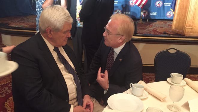 Arcadio Casilas, right, finance chairman for New York State Republicans, talks to former House Speaker Newt Gingrich on Monday, July 18, 2016 at a New York delegation breakfast at the Republican National Convention in Cleveland.