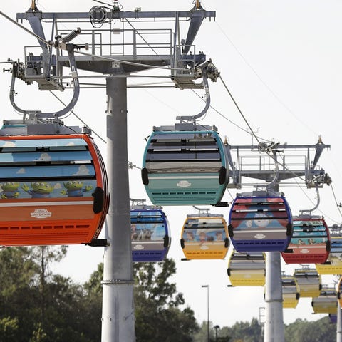 Gondolas move to various locations at Walt Disney 