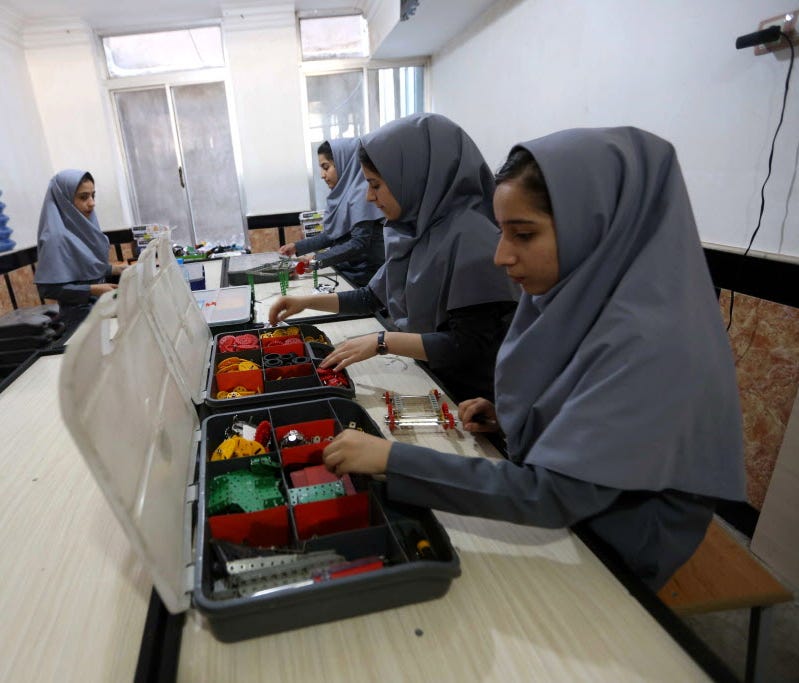 Afghan school girls work on robot machine at a school in Herat, Afghanistan on July 4, 2017. According to reports, six Afghan teenage girls have been denied visas to travel United States for an international robotics competition, but they will be per