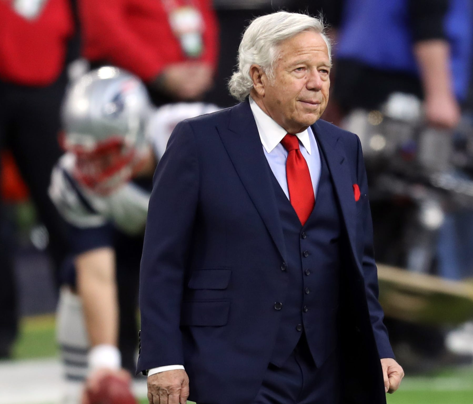 New England Patriots owner Robert Kraft walks onto the field before Super Bowl LII against the Philadelphia Eagles.