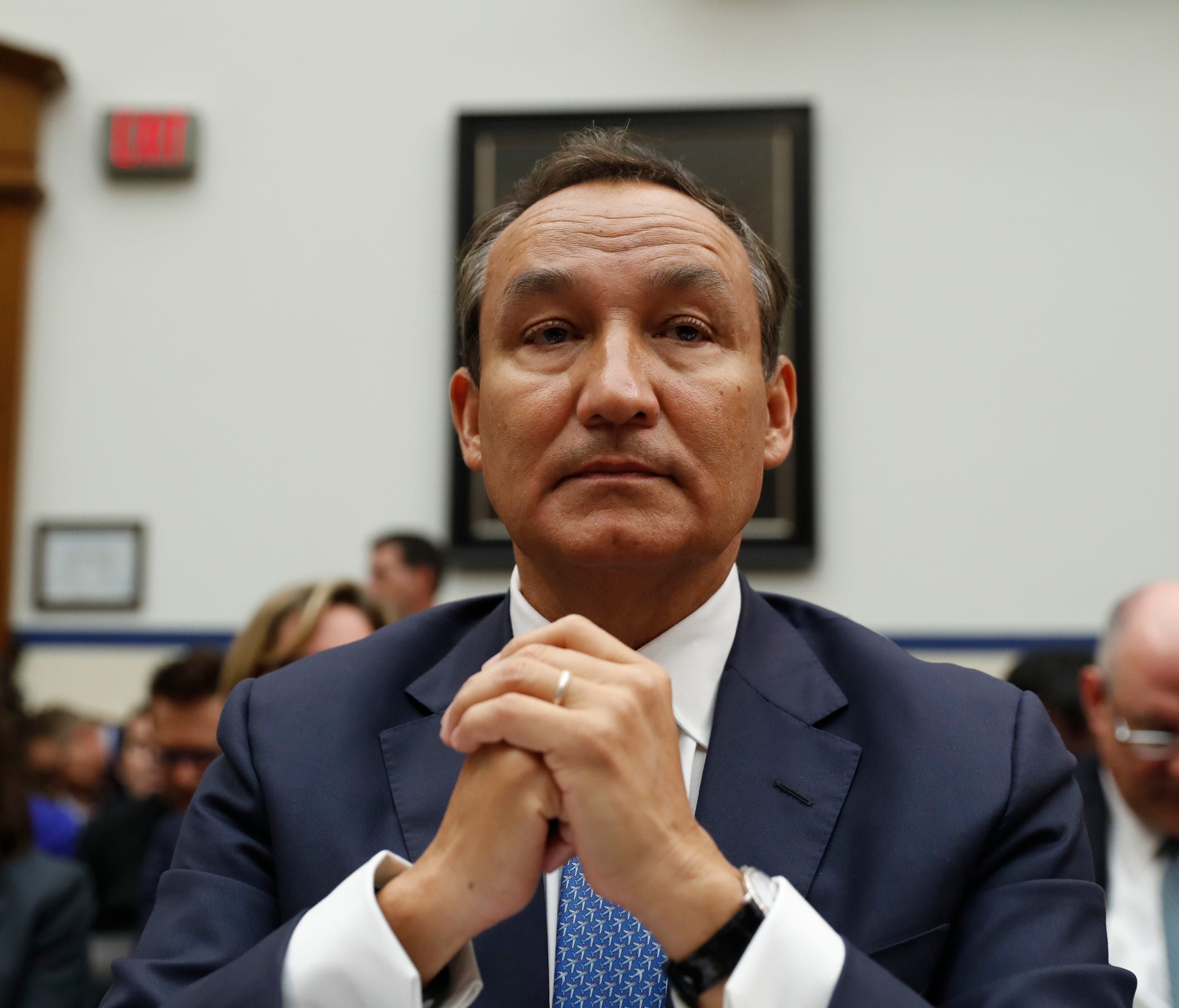 United Airlines CEO Oscar Munoz prepares to testify before a House Transportation Committee oversight hearing on May 2, 2017, on Capitol Hill in Washington.