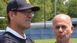 Michigan coach Jim Harbaugh, left, and AS Roma CEO