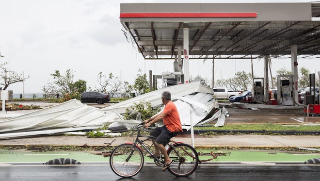 SAN JUAN, PUERTO RICO - SEPTEMBER 21: A damaged gas station the day after Hurricane Maria made landfall on September 21, 2017 in San Juan, Puerto Rico. The majority of the island has lost power, in San Juan many are left without running water or cell phone service, and the Governor said Maria is the "most devastating storm to hit the island this century." (Photo by Alex Wroblewski/Getty Images)