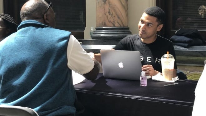 A recent job fair at the Rochester City Hall attracted several area residents looking to be Uber drivers although details over pay was unclear for some.